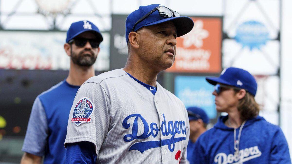 Dave Roberts and the Dodgers will face Colorado on Monday to determine the NL West champion.