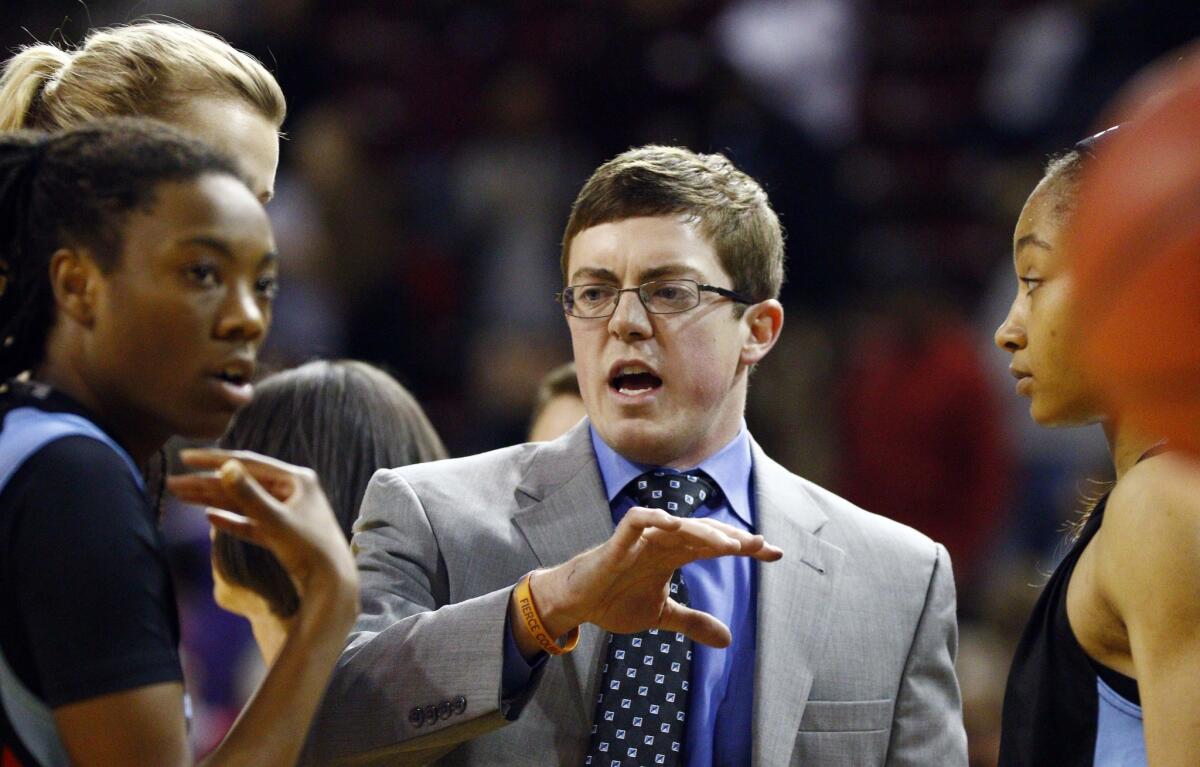 Former Louisiana Tech women's basketball coach Tyler Summitt talks to his players on the sidelines on Dec. 11. 2014.