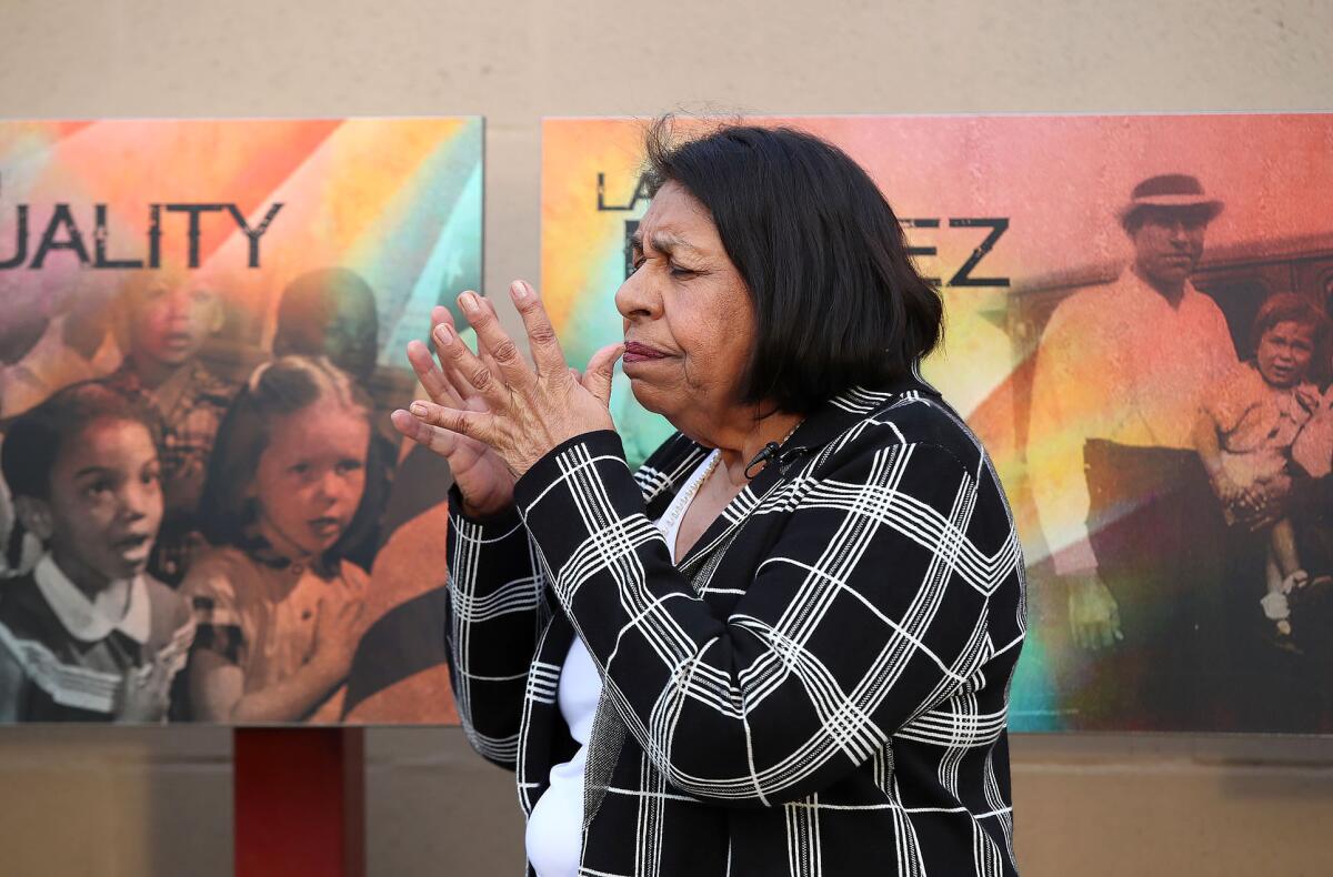 Sylvia Mendez speaks to Vanguard teaching-credential students at Mendez Tribute Monument Park.