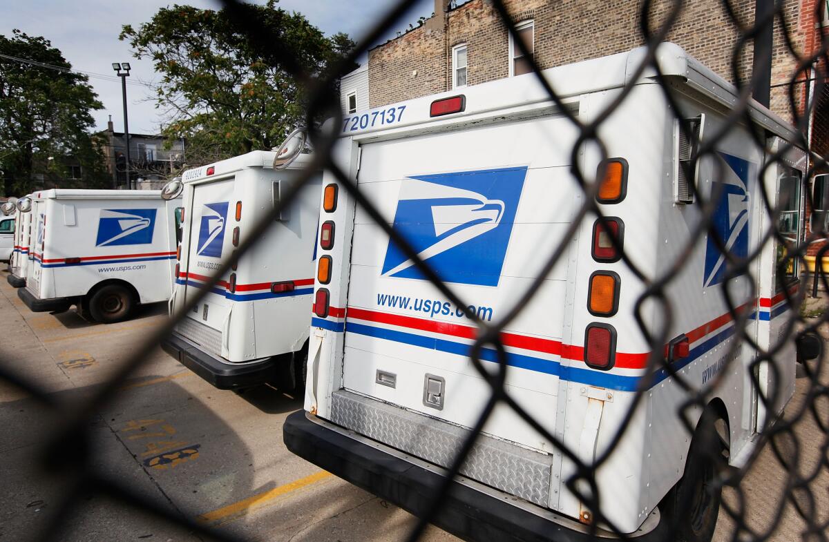 U.S. Postal Service trucks