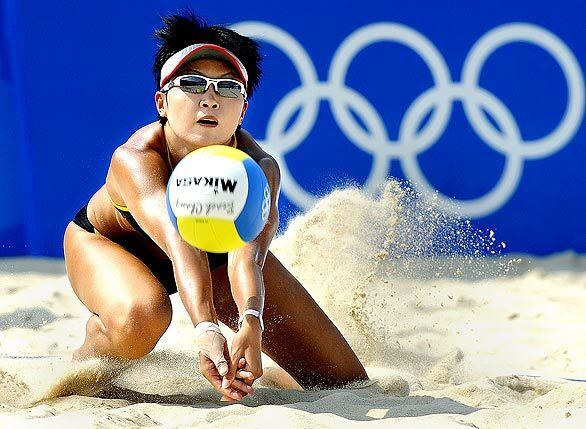 China's Wang Jie dives for a ball during a semifinal match against another China team at the 2008 Beijing Olympics. The team of Wang Jie and Jia Tian will play the USA's MIsty May-Treanor and Kerri Walsh for the gold medal.