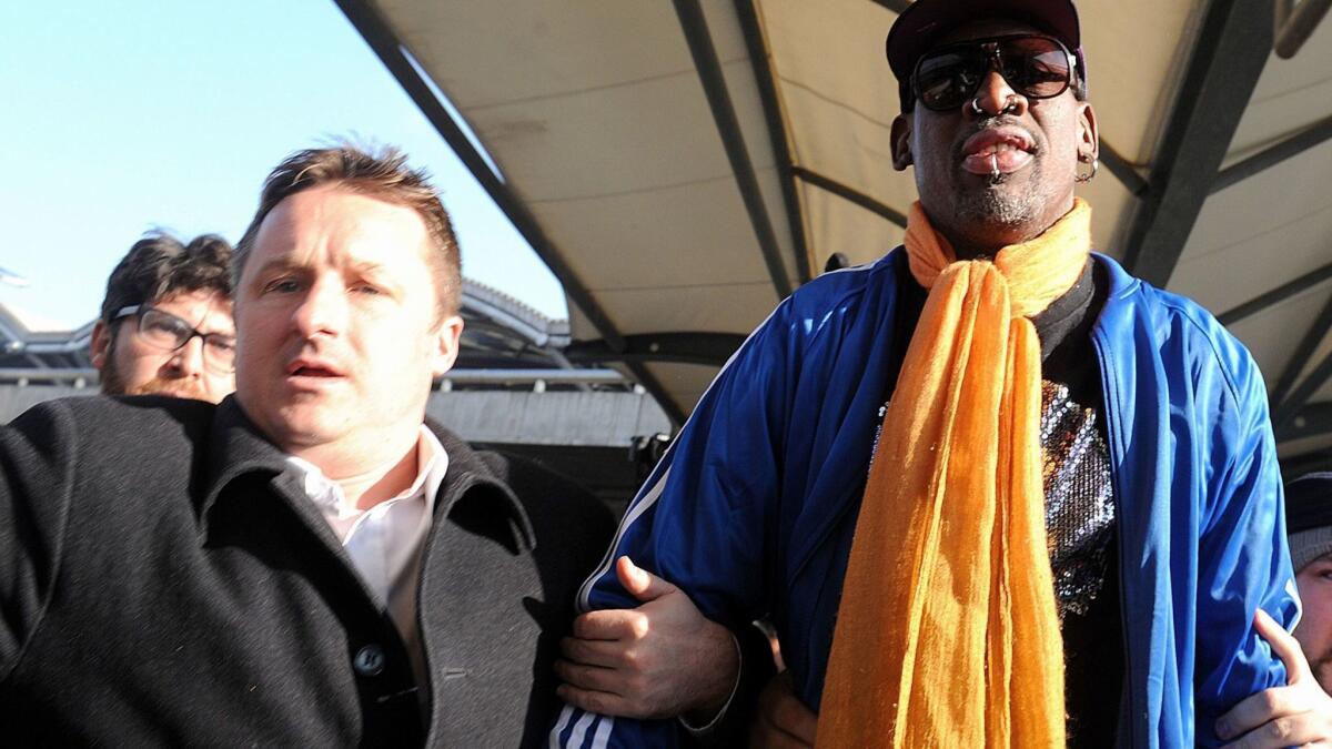 Michael Spavor, a Canadian who runs a China-based cultural exchange program with North Korea, arrives with former NBA star Dennis Rodman at Beijing International Airport after a trip to the communist country in 2014. Spavor was detained by Chinese authorities this week.