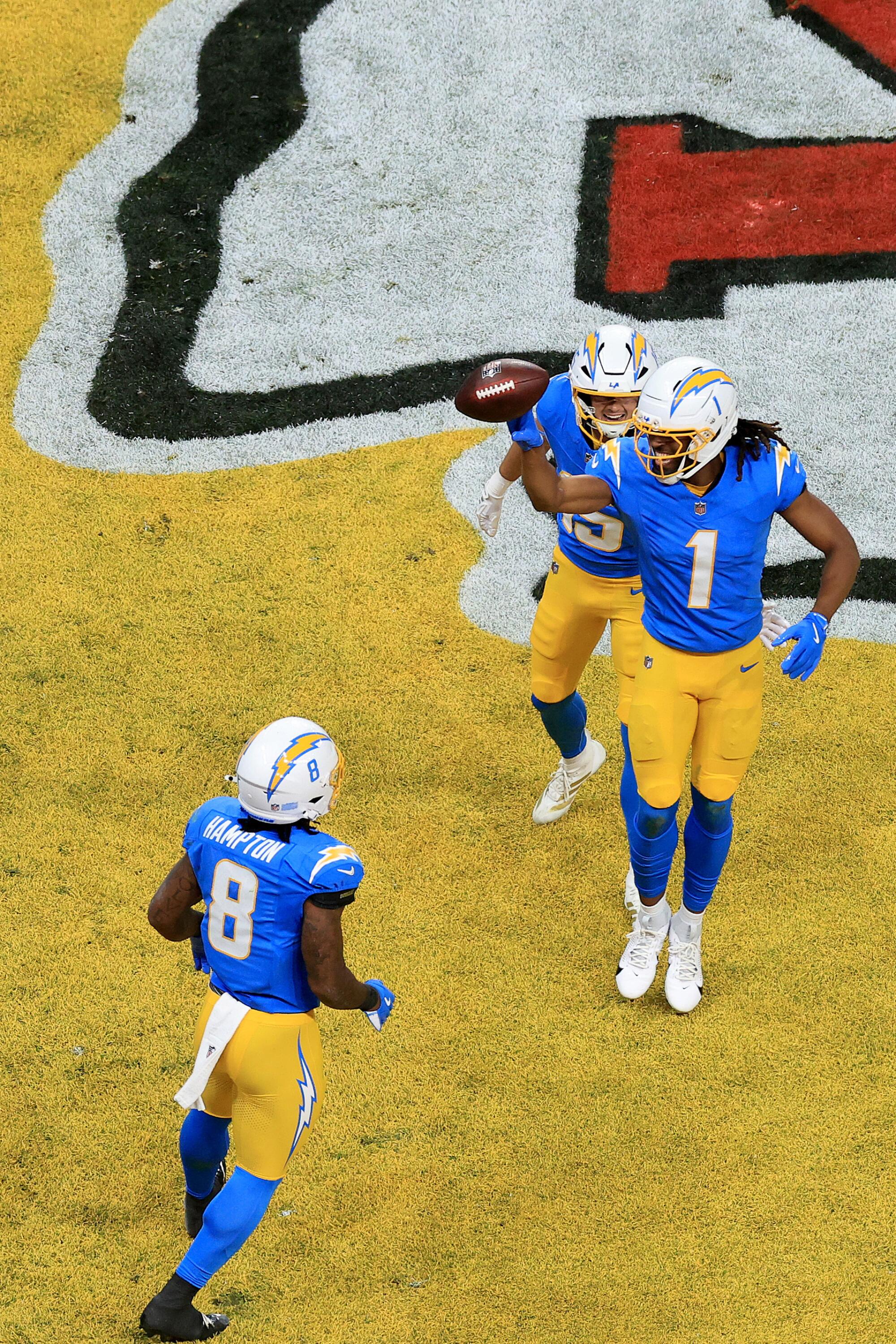 The charging receiver Quentin Johnston (1) famous with Ladd McConkey (15) and Omarion Hampton.