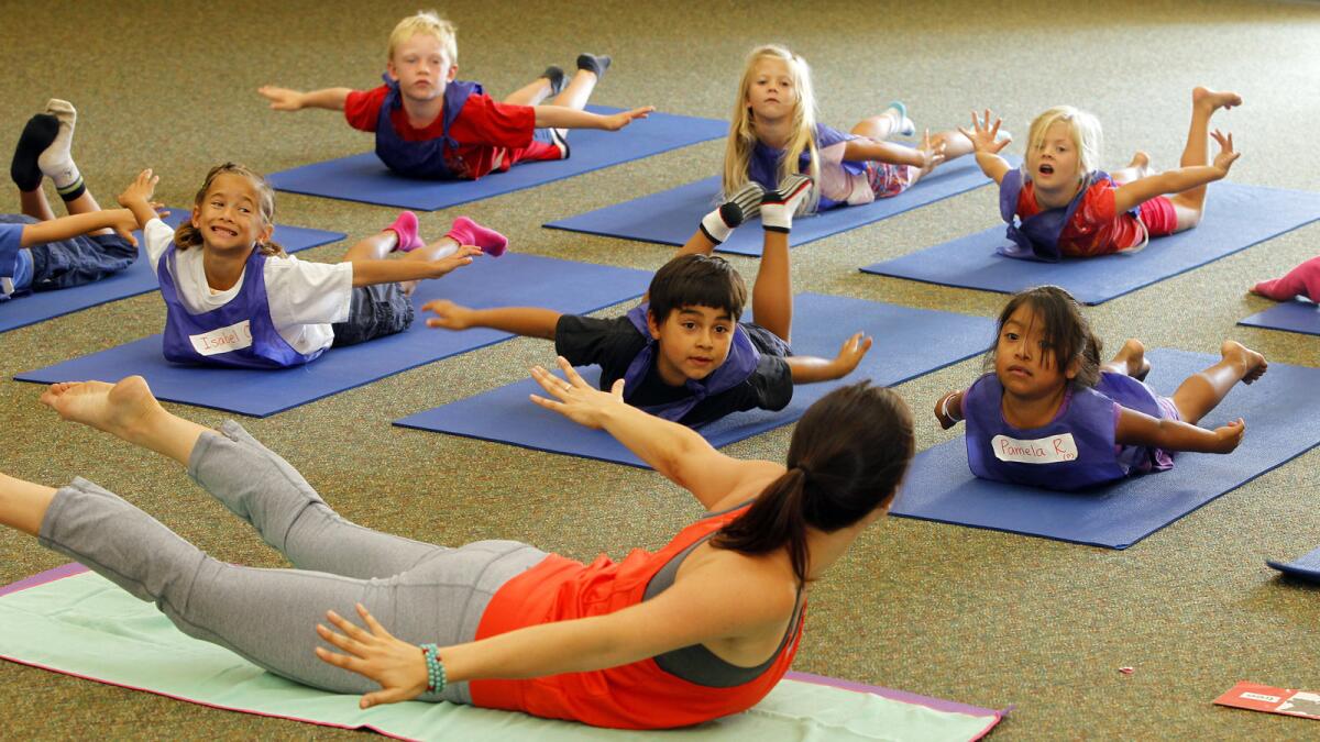 Paul Ecke Central Elementary School students attend two 40-minute yoga classes each week.
