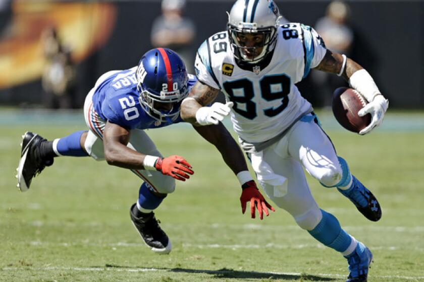 Steve Smith breaks free from Giants cornerback Prince Amukamara during a game with the Carolina Panthers last season.