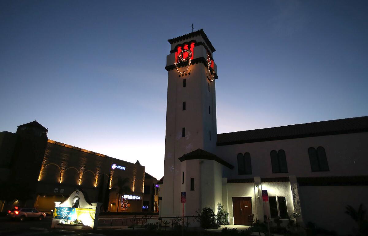 The bell tower at First United Methodist Church of Costa Mesa will be lighted Sunday during a community event.