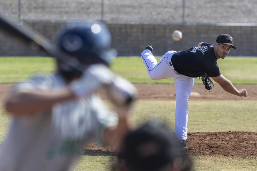 THOUSAND OAKS, CA - JUNE 27: Minor league pitcher Jeff Johnson pitches during a scrimmage with high school players at Waverly Park on Saturday, June 27, 2020 in Thousand Oaks, CA. (Brian van der Brug / Los Angeles Times)
