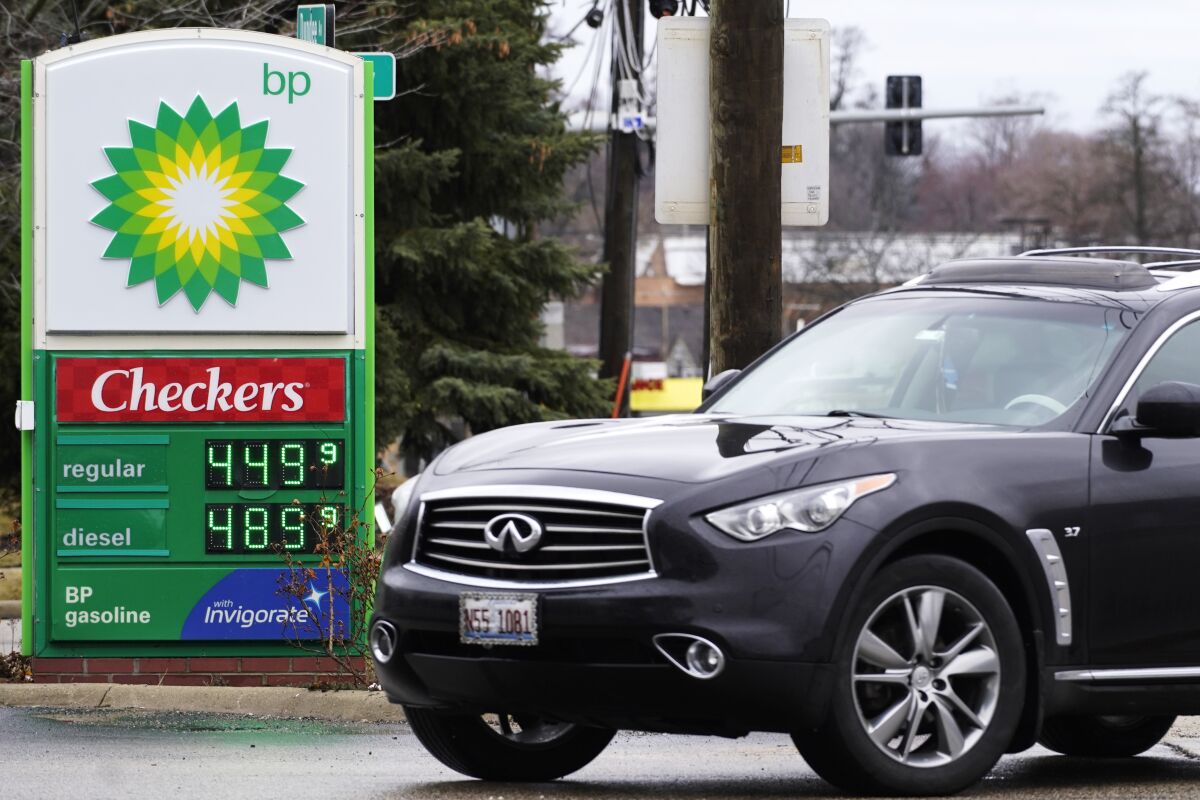 FILE - Gas prices are displayed at a BP gas station in Elgin, Ill., on March 19, 2022. Just as Americans gear up for summer road trips, the price of oil remains stubbornly high, pushing prices at the gas pump to painful heights. AAA said Tuesday, May 10, 2022, drivers are paying $4.37 for a gallon of regular gasoline. (AP Photo/Nam Y. Huh, File)