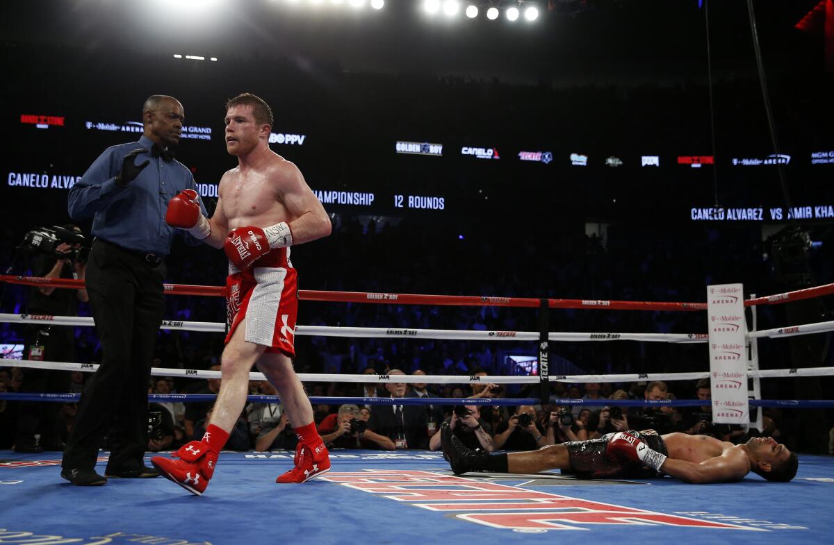 Boxing - Saul 'Canelo' Alvarez v Amir Khan WBC Middleweight Title - T-Mobile Arena, Las Vegas, United States of America - 7/5/16Canelo Alvarez walks away after knocking down Amir KhanAction Images via Reuters / Andrew CouldridgeLivepicEDITORIAL USE ONLY.