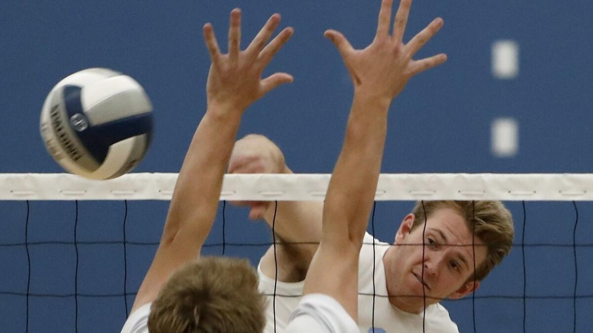 Brandon Hicks, shown competing on May 3, led Corona del Mar High past San Clemente in the CIF Southern Section Division 1 boys' volleyball playoffs on Tuesday.
