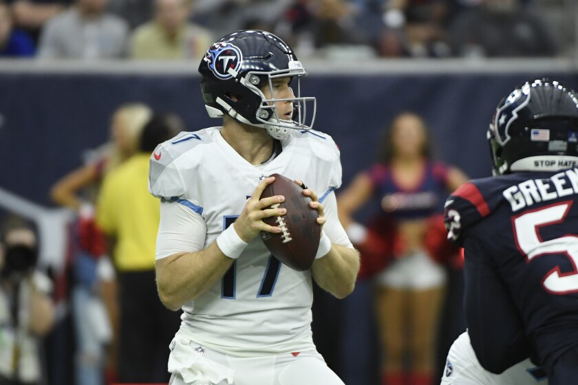 Tennessee Titans quarterback Ryan Tannehill (17) looks to throw against the Houston Texans during the first half of an NFL football game, Sunday, Jan. 9, 2022, in Houston. (AP Photo/Justin Rex )