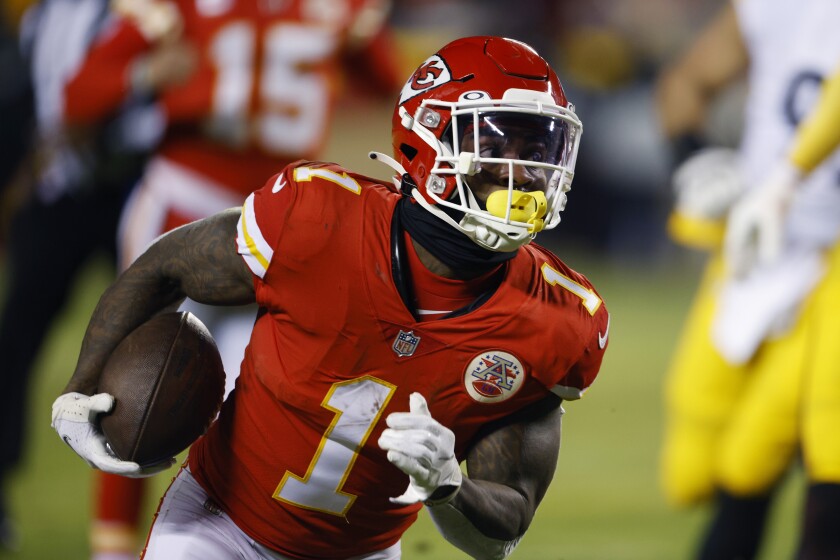 Kansas City Chiefs running back Jerick McKinnon (1) scores on a 4-yard touchdown reception during the first half of an NFL wild-card playoff football game against the Pittsburgh Steelers, Sunday, Jan. 16, 2022, in Kansas City, Mo. (AP Photo/Colin E. Braley)