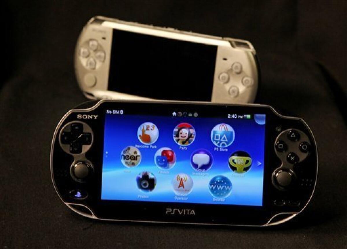 This Feb. 15, 2012 photo, shows Playstation PSVita, foreground, and its predecessor. In the age of “Angry Birds” and “Words With Friends” dominating people’s on-the-go playtime, Sony is making a push into the world of handheld gaming with a gadget aimed at loyal gamers and fans of the PlayStation. (AP Photo/Reed Saxon)