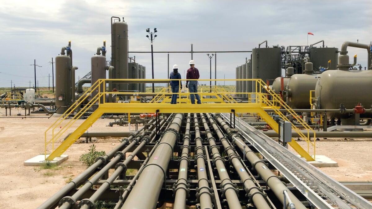 A natural gas production facility in New Mexico, part of the energy-rich oil and gas area in the Permian Basin. 
