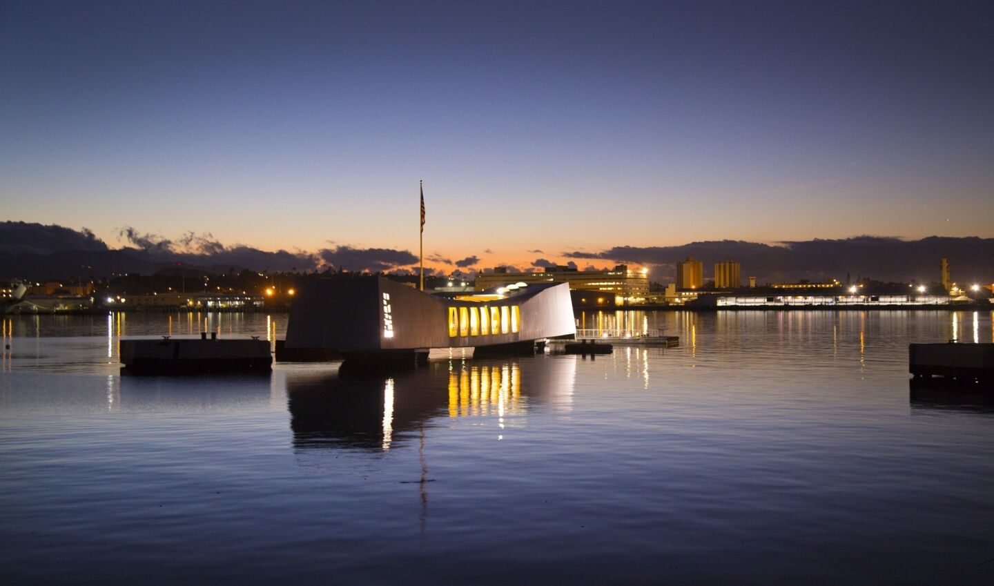 The sun prepares to rise behind the battleship USS Arizona Memorial at Pearl Harbor, Hawaii, as commemorations continue leading up to Wednesday, and the 75th anniversary of the Japanese attack on Pearl Harbor, December 7, 1941, thrusting The United States into World War II.