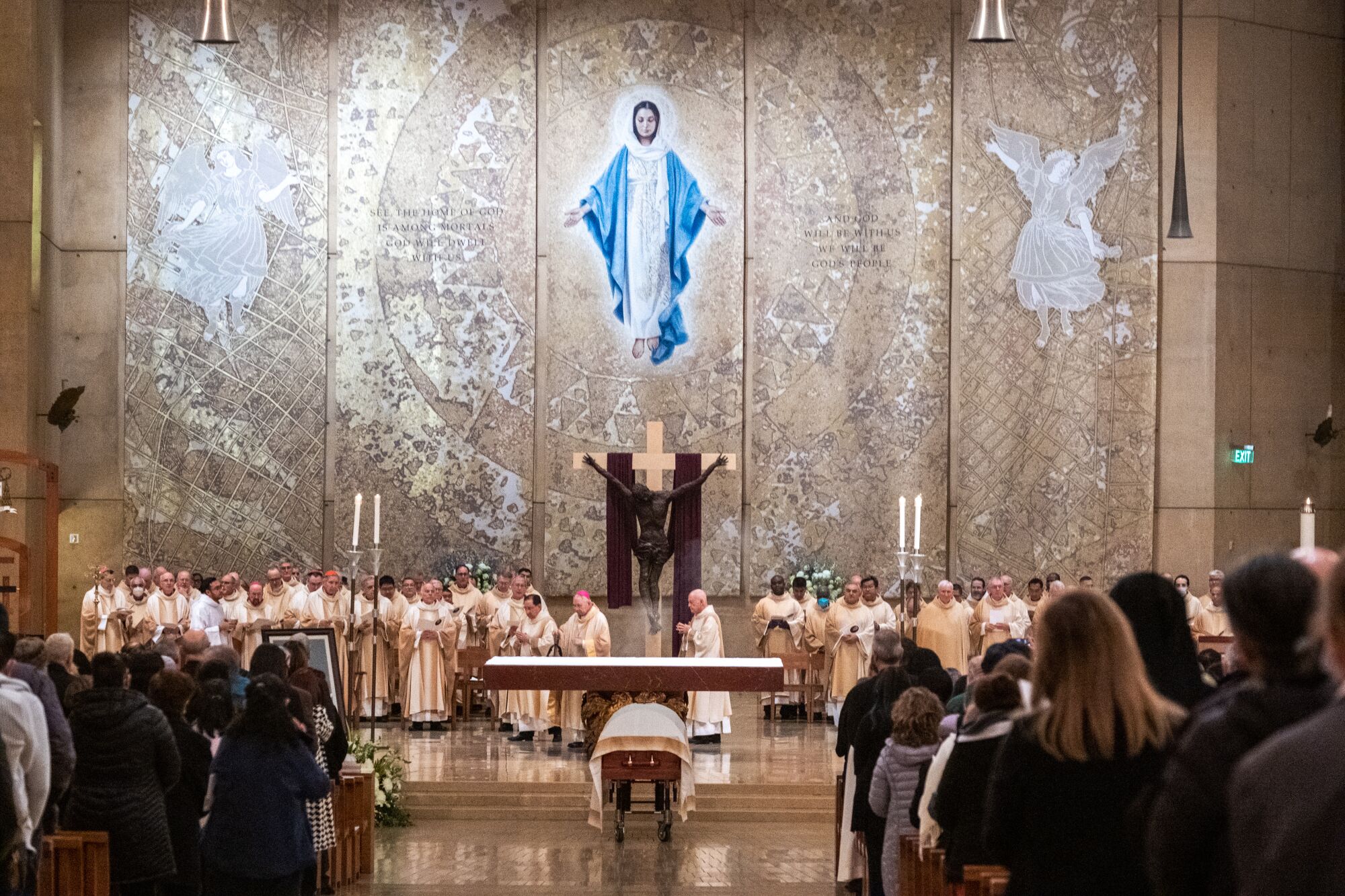 People gather at the Cathedral of Our Lady of the Angels  for a vigil Mass  