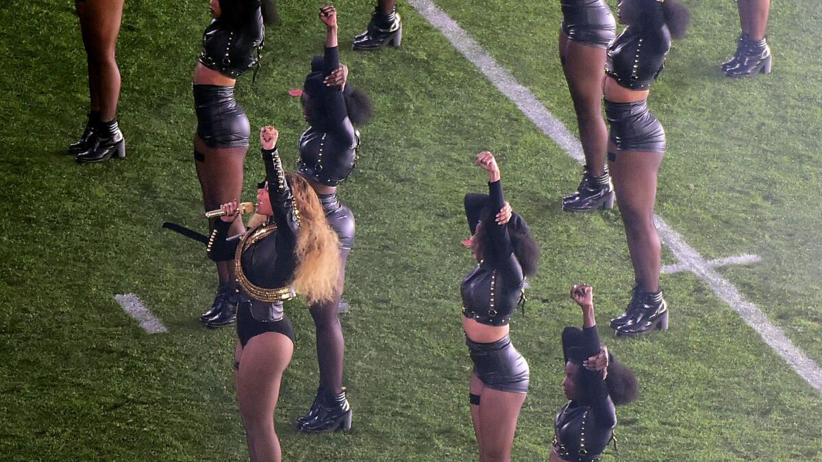Beyonce and her dancers perform at Super Bowl 50.