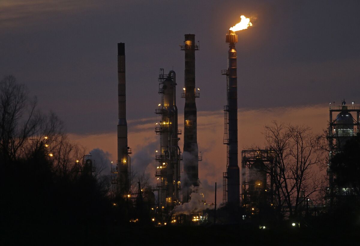 This photo shows the Exxon Mobil refinery at dusk in St. Bernard Parish, La. 