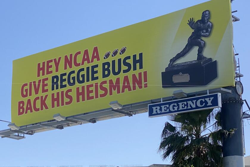 A billboard demanding the return of Reggie Bush's Heisman Trophy on White Oak and Ventura Blvd in Encino on April 26, 2023.