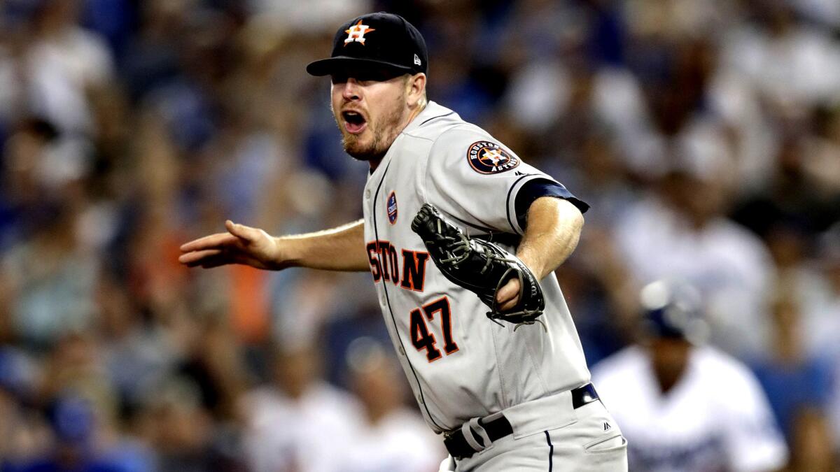 Astros reliever Chris Devenski reacts after recording the final out against the Dodgers to get the win in Game 2 of the World Series.