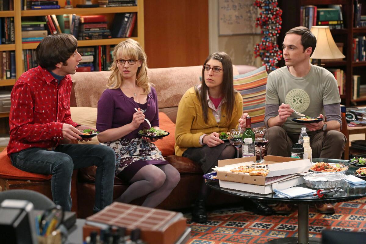 Simon Helberg, left, Melissa Rauch, Mayim Bialik and Jim Parsons are seen on the hit sitcom "The Big Bang Theory," which CBS says it's renewing for three more years. That would carry the show through its 10th season.