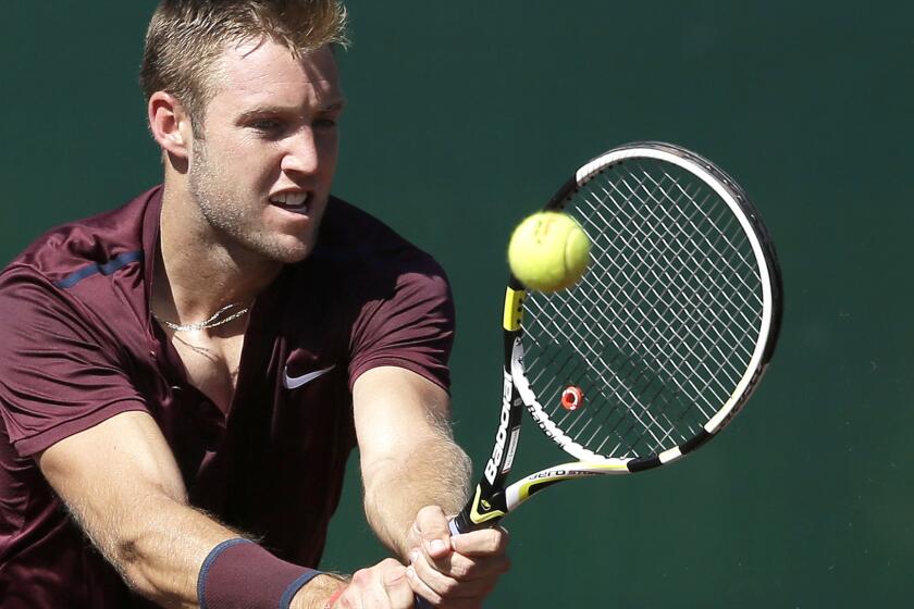 Jack Sock, shown returning a shot against Matthew Barton on Thursday, advanced to the U.S. Men's Clay Court Championship semifinals with a win Friday.
