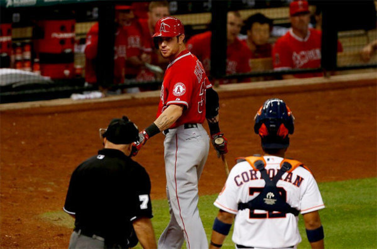 Angels' Josh Hamilton argues a called third strike with umpire Brian O'Nora during Tuesday's game against the Houston Astros.