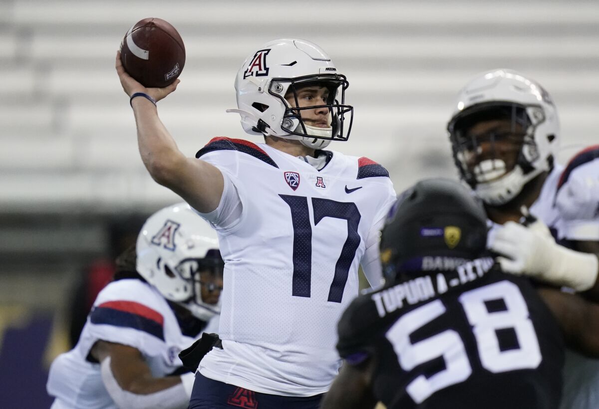 Arizona quarterback Grant Gunnell passes against Washington.