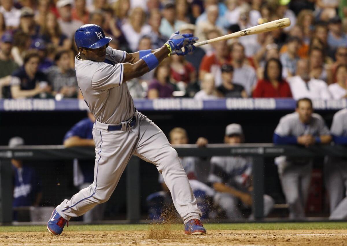 Dodgers rookie Yasiel Puig grounds out against the Colorado Rockies on Thursday.