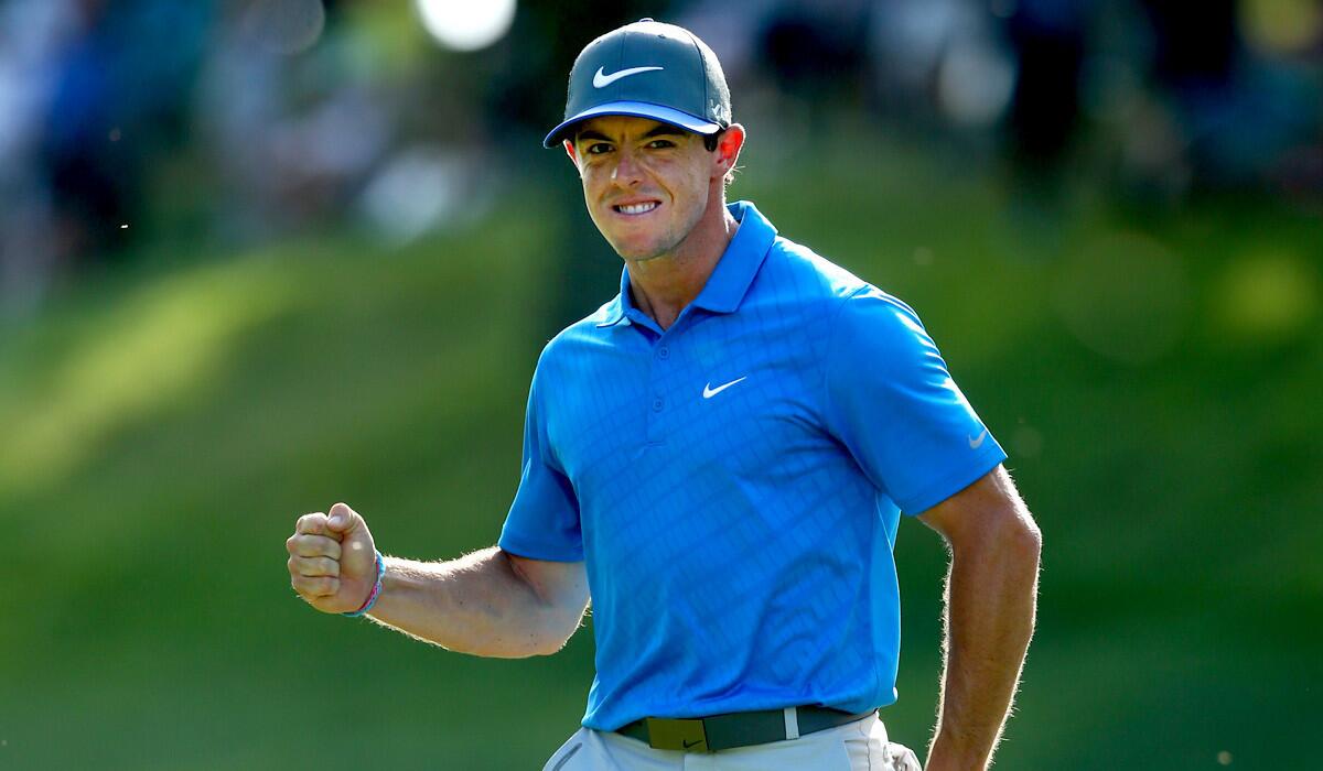 Rory McIlroy reacts after sinking a birdie putt at No. 15 during the third round of the PGA Championship at Valhalla Golf Club on Saturday.