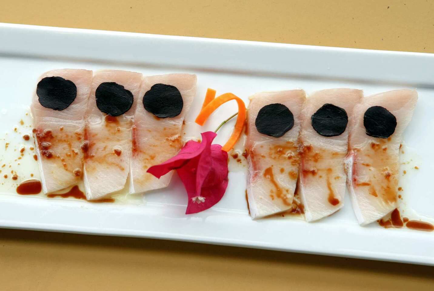 Yellowtail sashimi with black truffles is one of the items served at Got Sushi? in Northridge.
