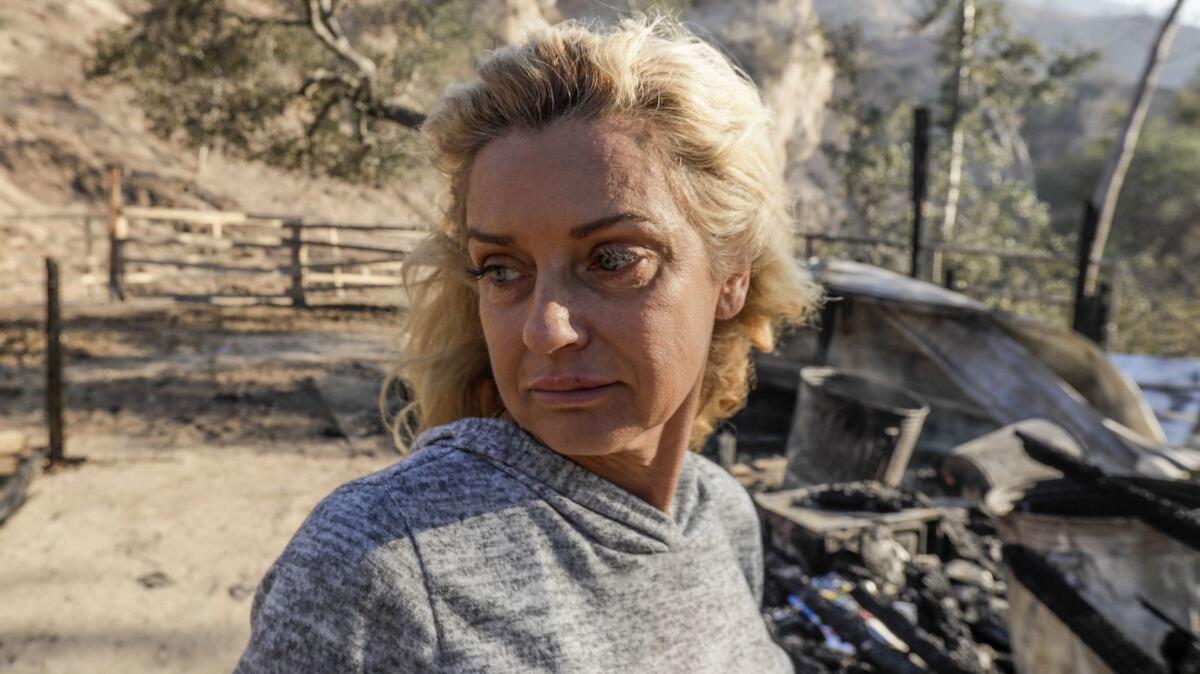 Gail Thackray says she saw sparks flying off a high-voltage transmission tower in Little Tujunga Canyon, where the Creek fire first ignited.