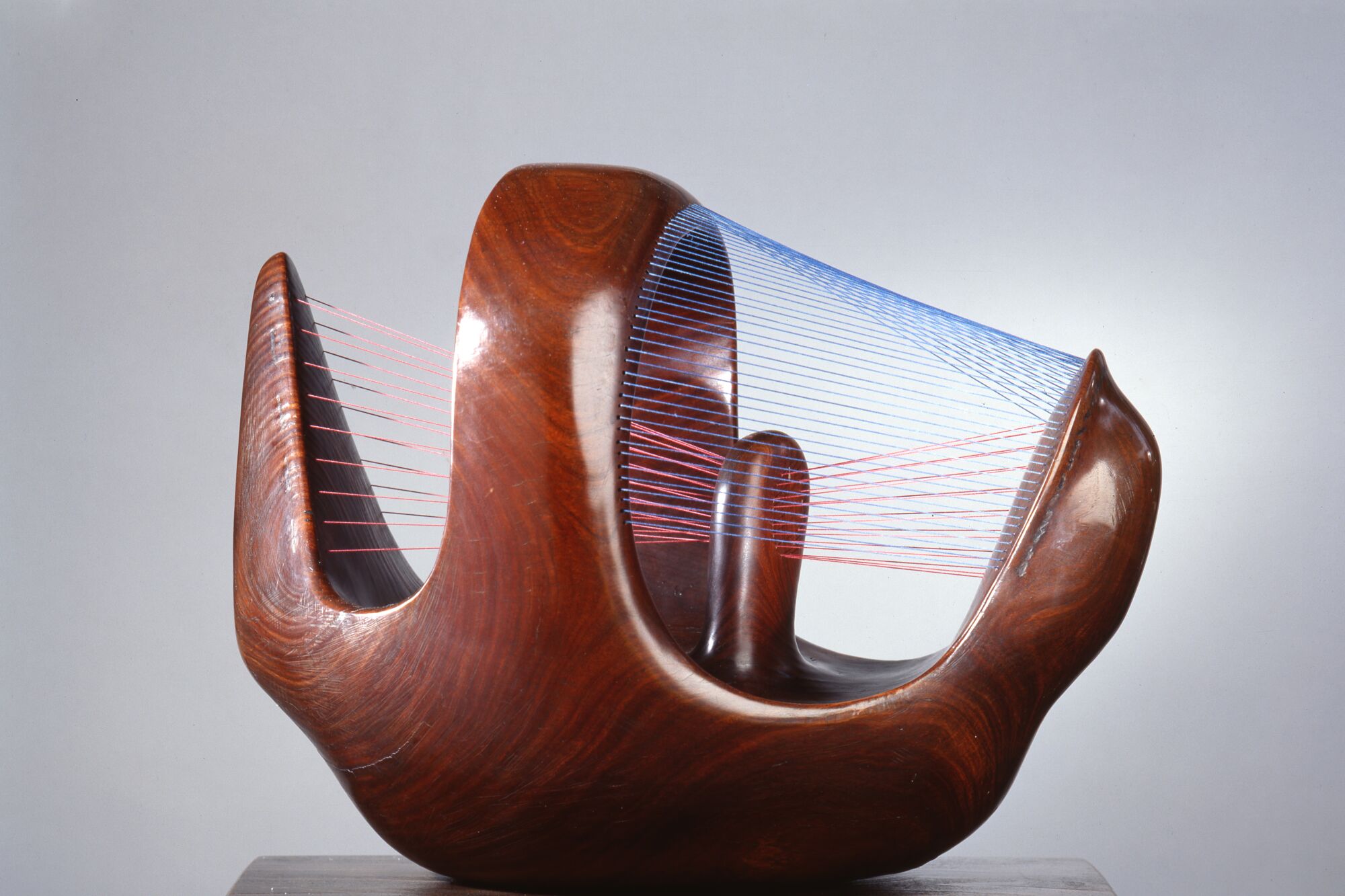 Henry Moore "Bird Basket" wood sculpture.