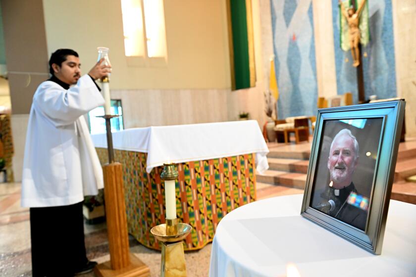 Los Angeles, California February 19, 2023-A picture of Bishop David O'Connell is honored at the St. Francis X. Cabrini Parish in Los Angeles Sunday. (Wally Skalij/(Los Angeles Times)