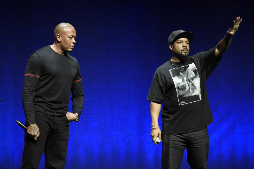 N.W.A members Dr. Dre, left, and Ice Cube are two of the subjects of the upcoming biographical drama "Straight Outta Compton." Dr. Dre's new album, "Compton: A Soundtrack," arrives Friday.