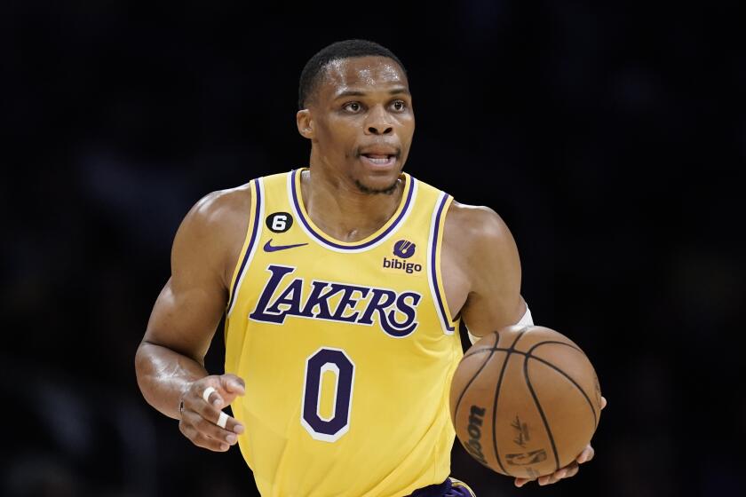 Los Angeles Lakers' Russell Westbrook dribbles the ball during first half of an NBA preseason basketball game against the Minnesota Timberwolves Wednesday, Oct. 12, 2022, in Los Angeles. (AP Photo/Jae C. Hong)
