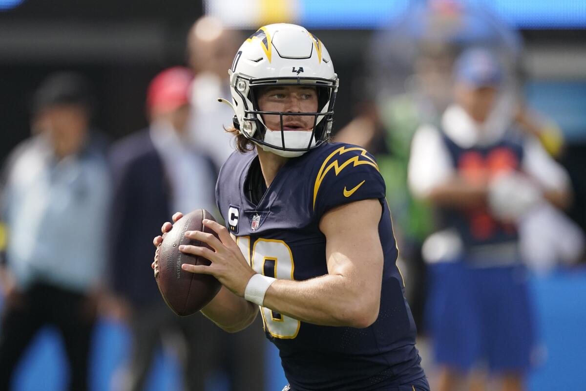 Chargers quarterback Justin Herbert looks to pass in the first half Sunday.