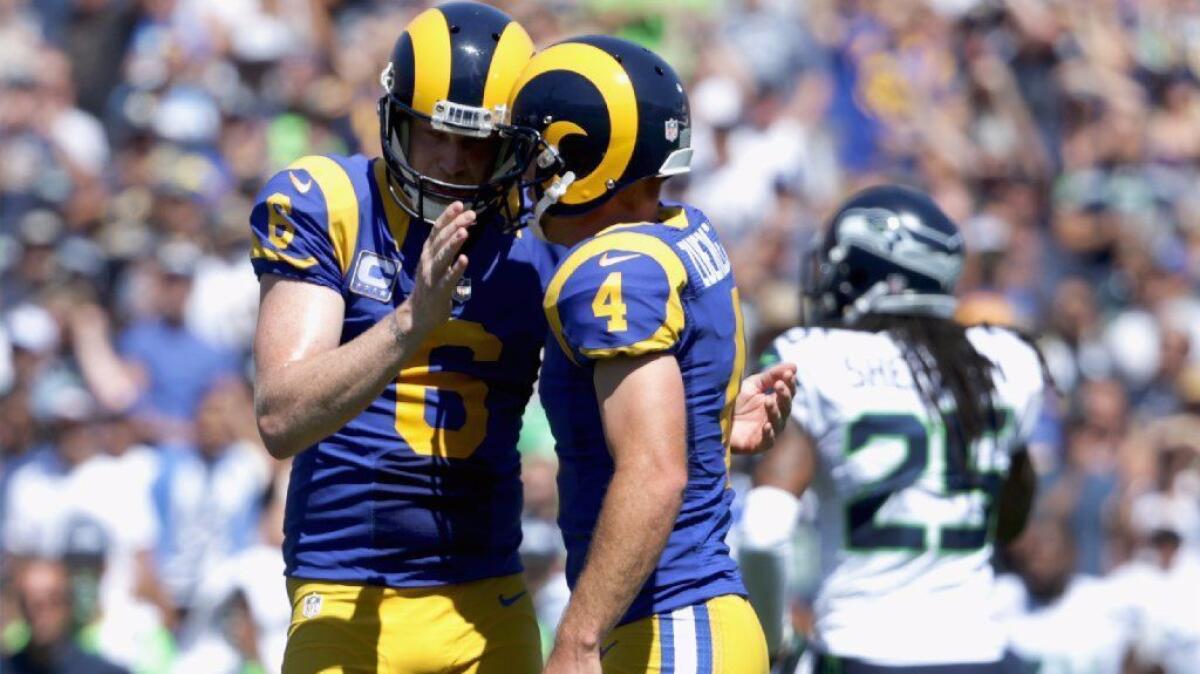 Rams punter Johnny Hekker (6), who also serves as holder on placement attempts, congratulates kicker Greg Zuerlein (4) after a field goal against Seattle on Sept. 18.