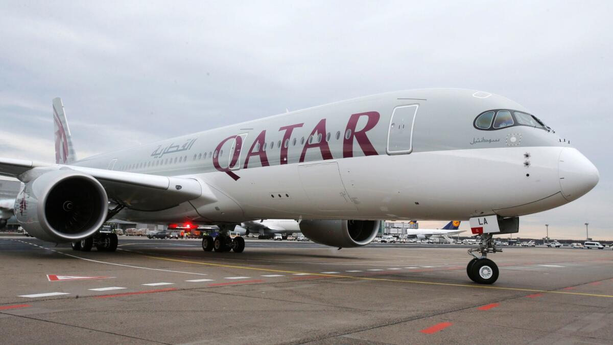 A Qatar Airways jet approaches the terminal at the Frankfurt, Germany, airport in 2015.