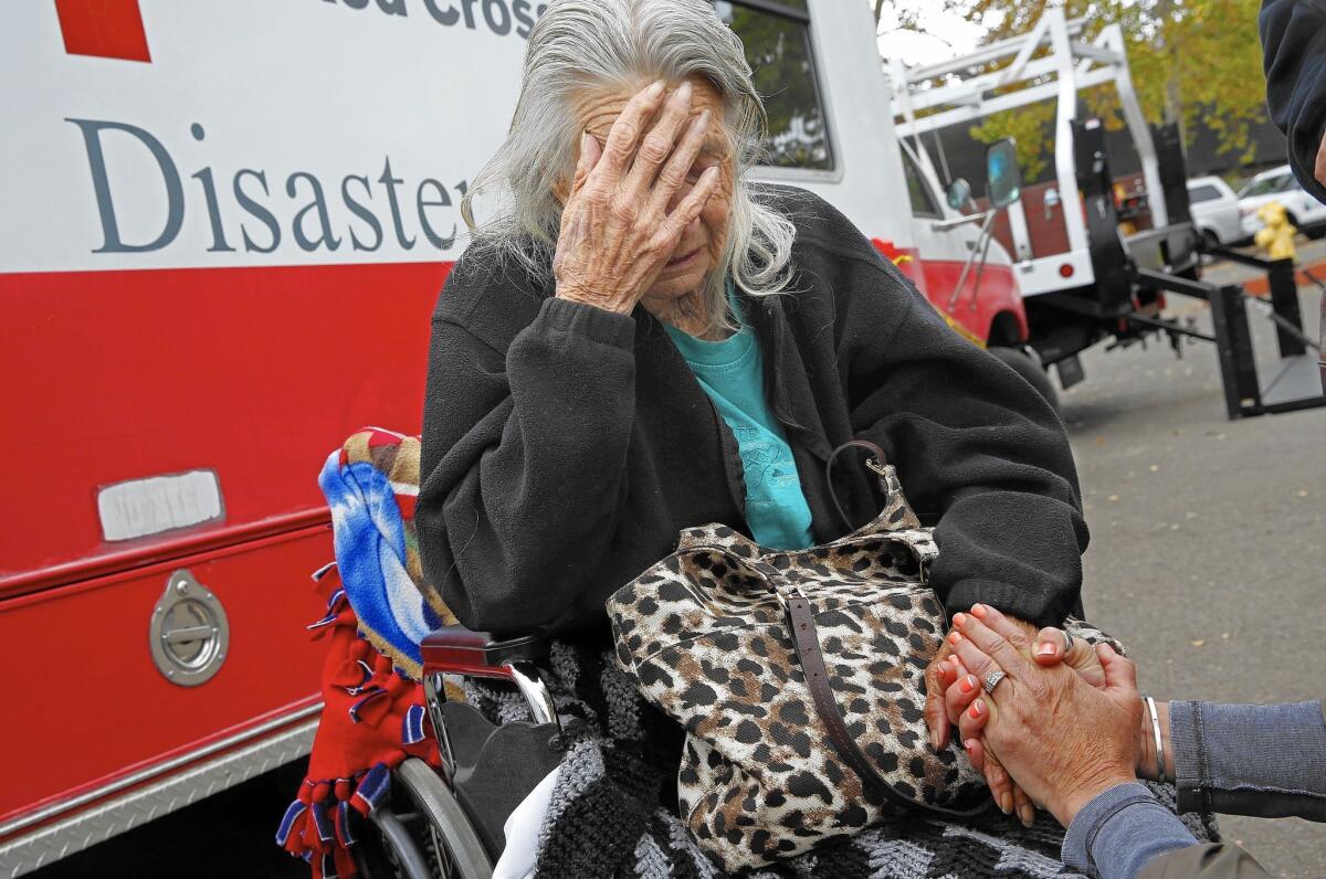 Winnie Pugh was evacuated from her home by her sons after she refused to go with firefighters.