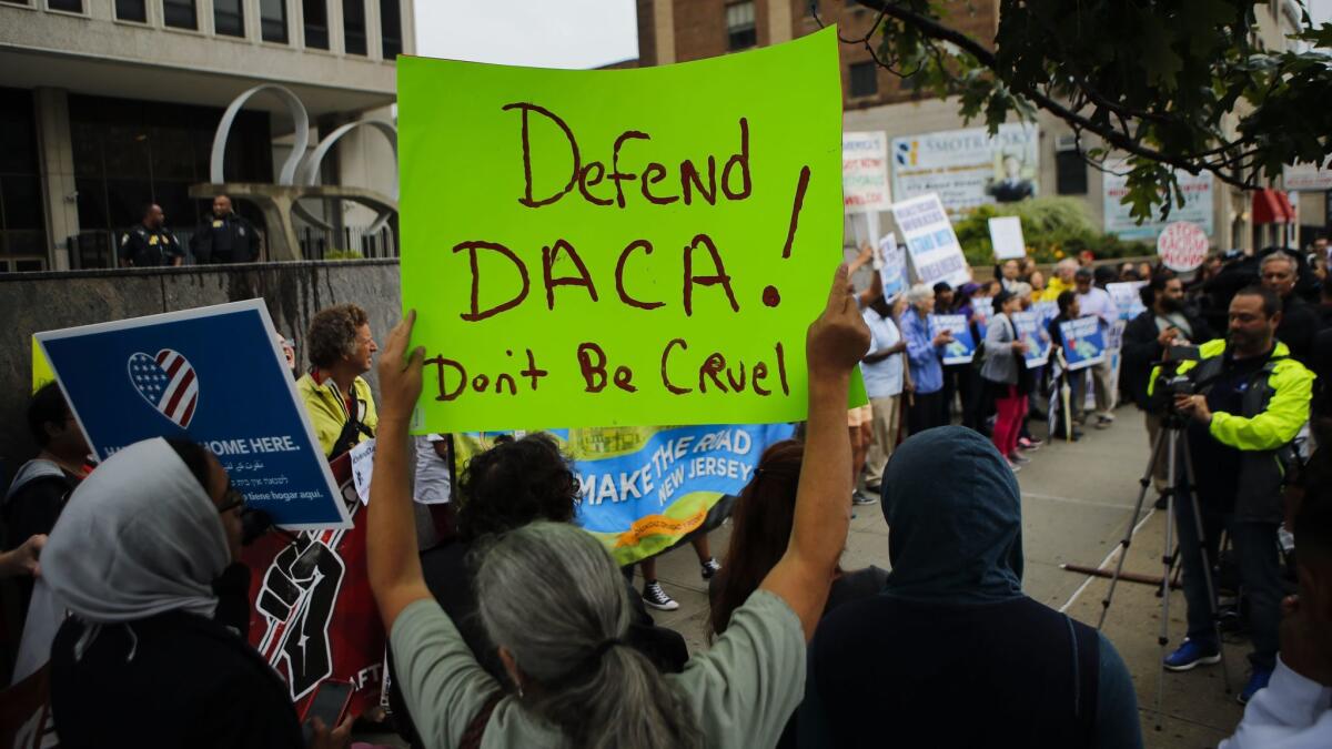 Immigration activists protest in Newark, N.J., last month against the Trump administration's decision to end the Deferred Action for Childhood Arrivals program.