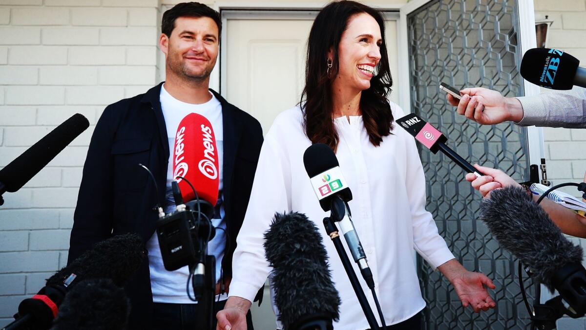 Prime Minister Jacinda Ardern and her partner Clarke Gayford announce her pregnancy to reporters on Jan. 19, 2018, in Auckland, New Zealand.