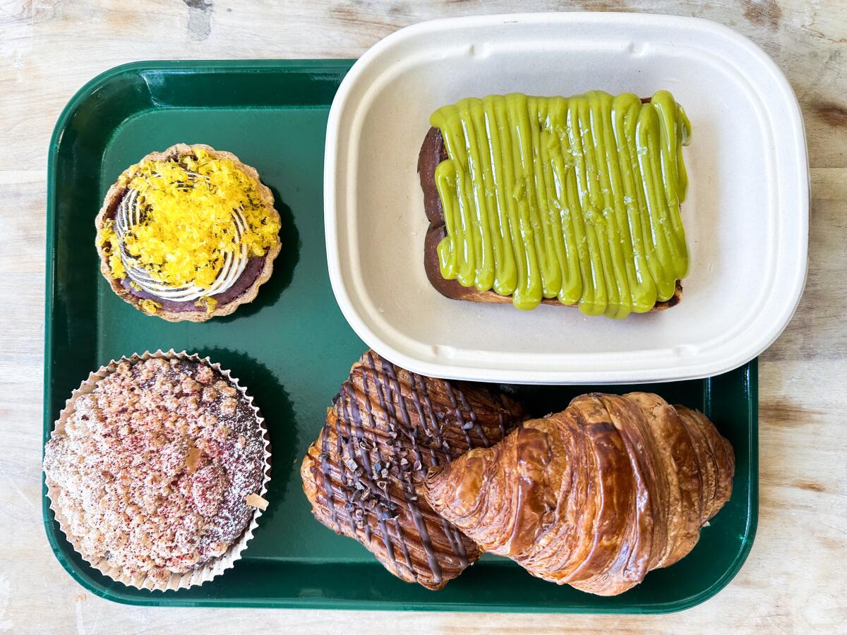 A spread of pastries at Breadbelly in San Francisco, including the bakery's famous pandan-infused kaya toast.