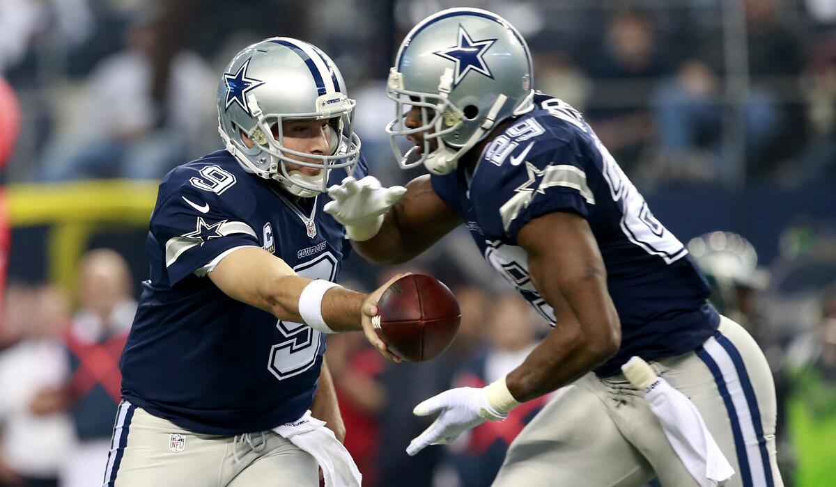 Quarterback Tony Romo (9) and running back DeMarco Murray have been a tough combination on the road this season for the Cowboys.