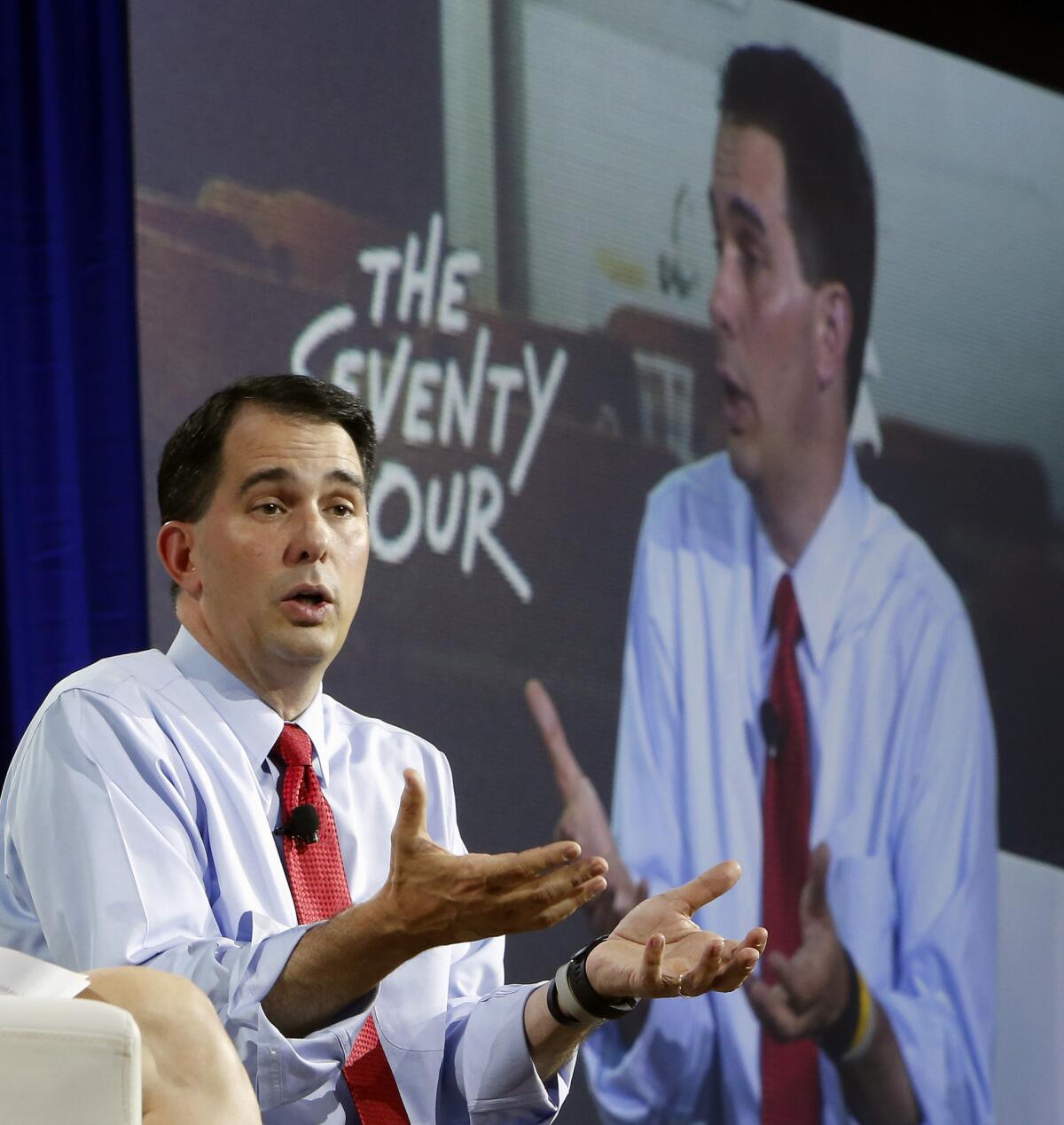 Wisconsin Gov. Scott Walker, who is vying for the GOP nomination for president, speaks during an education summit Wednesday in Londonderry, N.H.