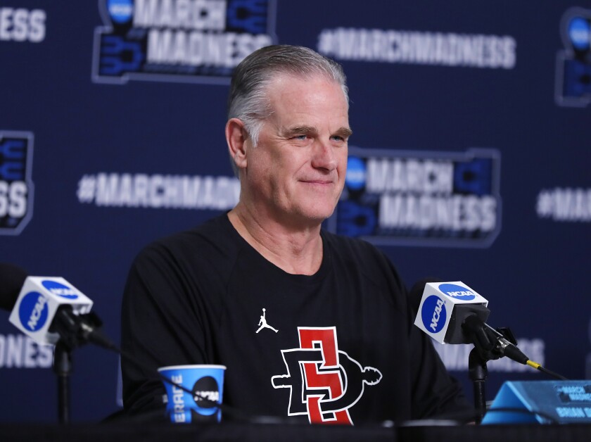 San Diego State basketball coach Brian Dutcher speaks at news conference before NCAA Tournament game.