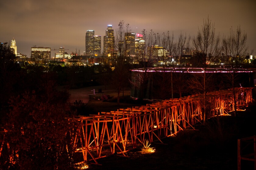The Industry’s opera ‘Sweet Land’ is staged at Los Angeles State Historic Park, with the L.A. skyline in the distance