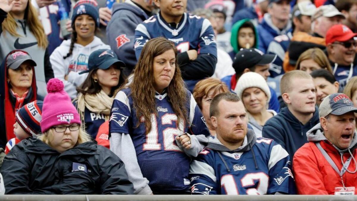 New England Patriots fans watch as the clock winds down on their team's 16-0 loss to the Buffalo Bills on Oct. 2.