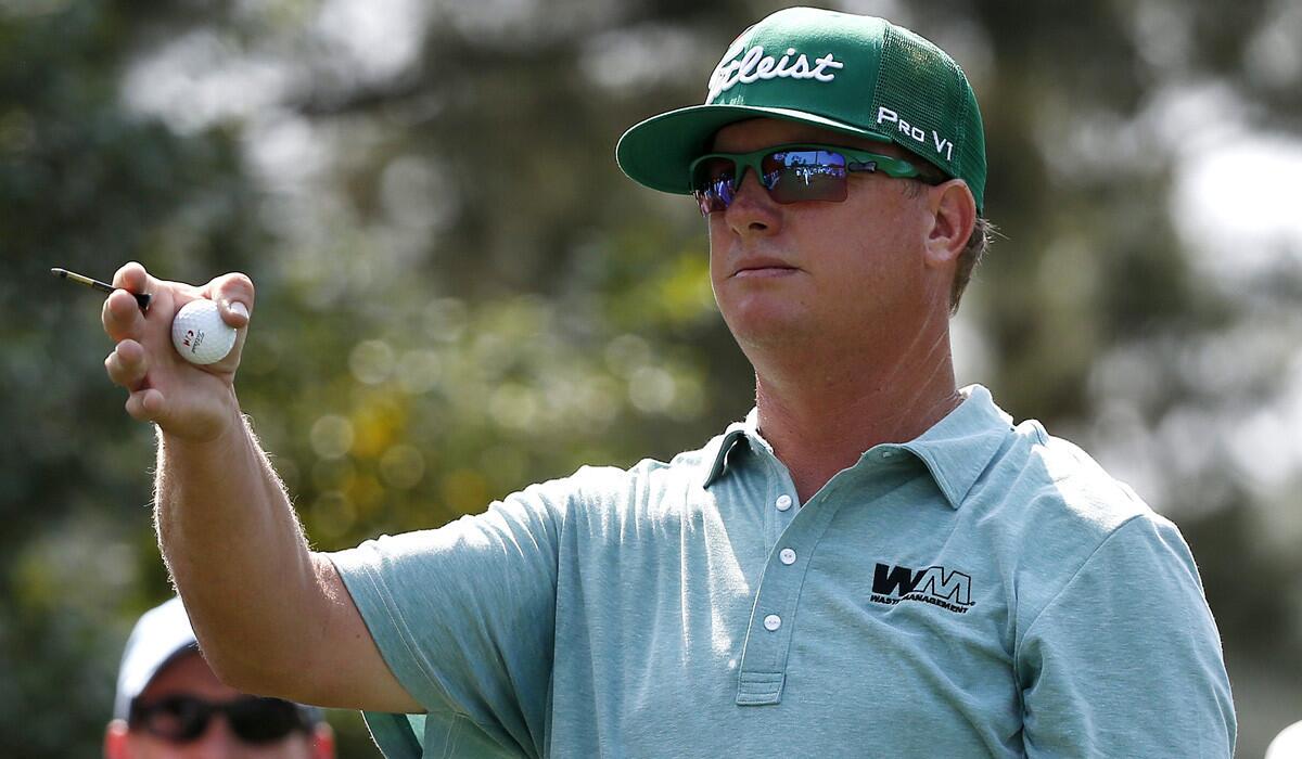 Charley Hoffman gestures on the eighteenth hole during the first round at the 2015 Masters Tournament at the Augusta National Golf Club on Thursday.