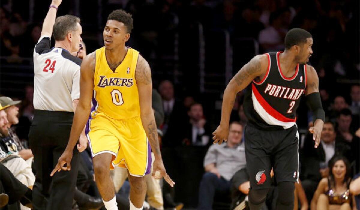 Nick Young caught fire against Portland, scoring a season-high 40 points in the Lakers' loss Tuesday to the Trail Blazers, 124-112.